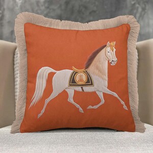 Don’t settle for boring decor. Our Fringed Equestrian Horse Pillow Cover is the missing piece in your home styling puzzle. With its vibrant colors, detailed artwork, and luxurious tassels, it’s designed to be noticed and loved. Order yours today and experience the perfect combination of equestrian tradition and modern comfort.