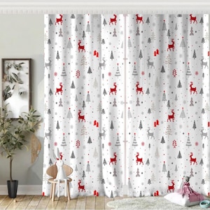 May include: White Christmas-themed curtains featuring a repeating pattern of red reindeer, Christmas trees, and snowflakes. The trees are in shades of grey and black, with red accents. The curtains are hanging in front of a window.