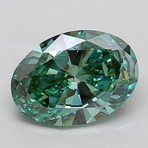 3.01 Ct Lab Diamond VS2 Oval Cut IGI Certified Fancy Vivid Green