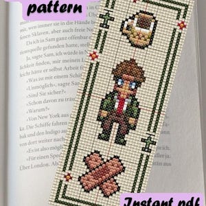 May include: A cross-stitch pattern bookmark with a pixelated design. The bookmark features a figure, a coffee mug, and a bandage. The text "Cross stitch pattern" and "Instant pdf download" are also visible.