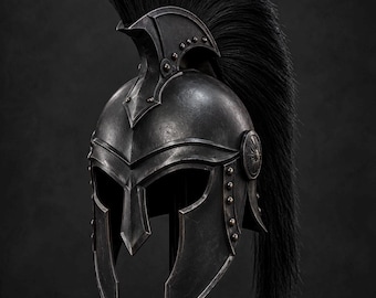 May include: A dark metallic Spartan-style helmet featuring a prominent black horsehair crest that extends from the front to the back. The helmet has a weathered finish, a central nasal guard, and circular side medallions with rivet details.