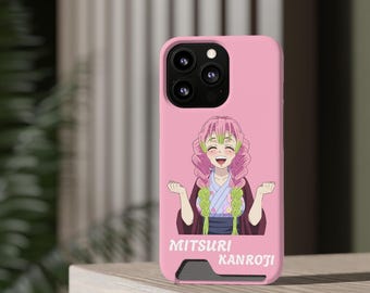 May include: A pink phone case featuring a smiling anime character with pink and green hair. The character is wearing a patterned kimono. The text "Mitsuri Kanroji" is printed in white at the bottom of the case.