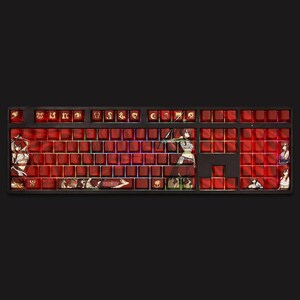 May include: A custom mechanical keyboard with red keycaps and a black frame. The keycaps feature anime character illustrations and the "Fairy Tail" logo. The keyboard has a full layout with a variety of function keys and a number pad.