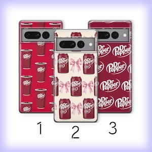 May include: Three phone cases with Dr. Pepper designs. One case features red cups, another has red cans and pink bows, and the third displays the Dr. Pepper logo. The cases are red and white.