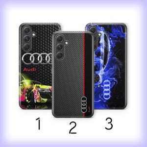 May include: Three phone cases with Audi logos. Case 1 is black with a textured pattern, the Audi logo, and a colorful car graphic. Case 2 is black with a carbon fiber texture and a red stripe. Case 3 is black with a blue smoke design and the Audi logo.