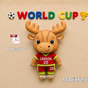 May include: A felt moose wearing a red soccer jersey with "CANADA 20" on it, standing in front of the words "WORLD CUP". A soccer ball and trophy are also present. The text "PDF+SVG" and "MagixFelt" are also visible.