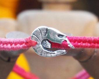 A gorgeous simple tiny shrimp handmade in fine silver on a deep pink and reds leather, sterling silver and cotton friendship bracelet...