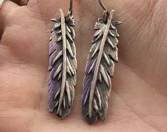 A wonderful pair of handmade fine silver feathers on sterling silver wires