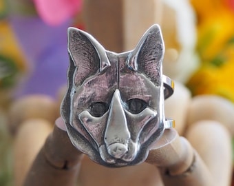 A beautiful Fox head ring made from eco friendly fine silver with an adjustable sterling silver band...