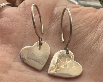 Delightful simple fine silver heart earrings on handmade sterling silver wires.