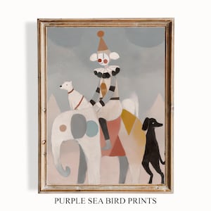 May include: A framed art print featuring a whimsical circus scene. A clown rides an elephant, accompanied by a white dog and a black dog. The artwork has a muted color palette with a vintage aesthetic. The text "PURPLE SEA BIRD PRINTS" is at the bottom.