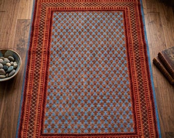Handgeknüpfter Wollteppich, Teppich in Blau- und Rottönen