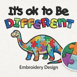 May include: An embroidered design featuring a colorful dinosaur composed of puzzle pieces. The text "It's ok to Be DIFFERENT" is above the dinosaur. A circular detail shows a close-up of the puzzle pieces. The words "Embroidery Design" are below.