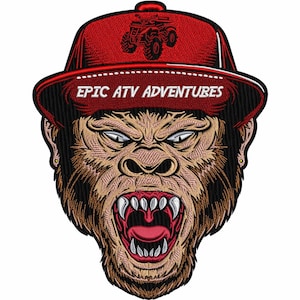 May include: Embroidered patch featuring a gorilla wearing a red baseball cap. The cap has the text "EPIC ATV ADVENTURES" and an ATV graphic. The gorilla has an open mouth with visible teeth and a fierce expression.