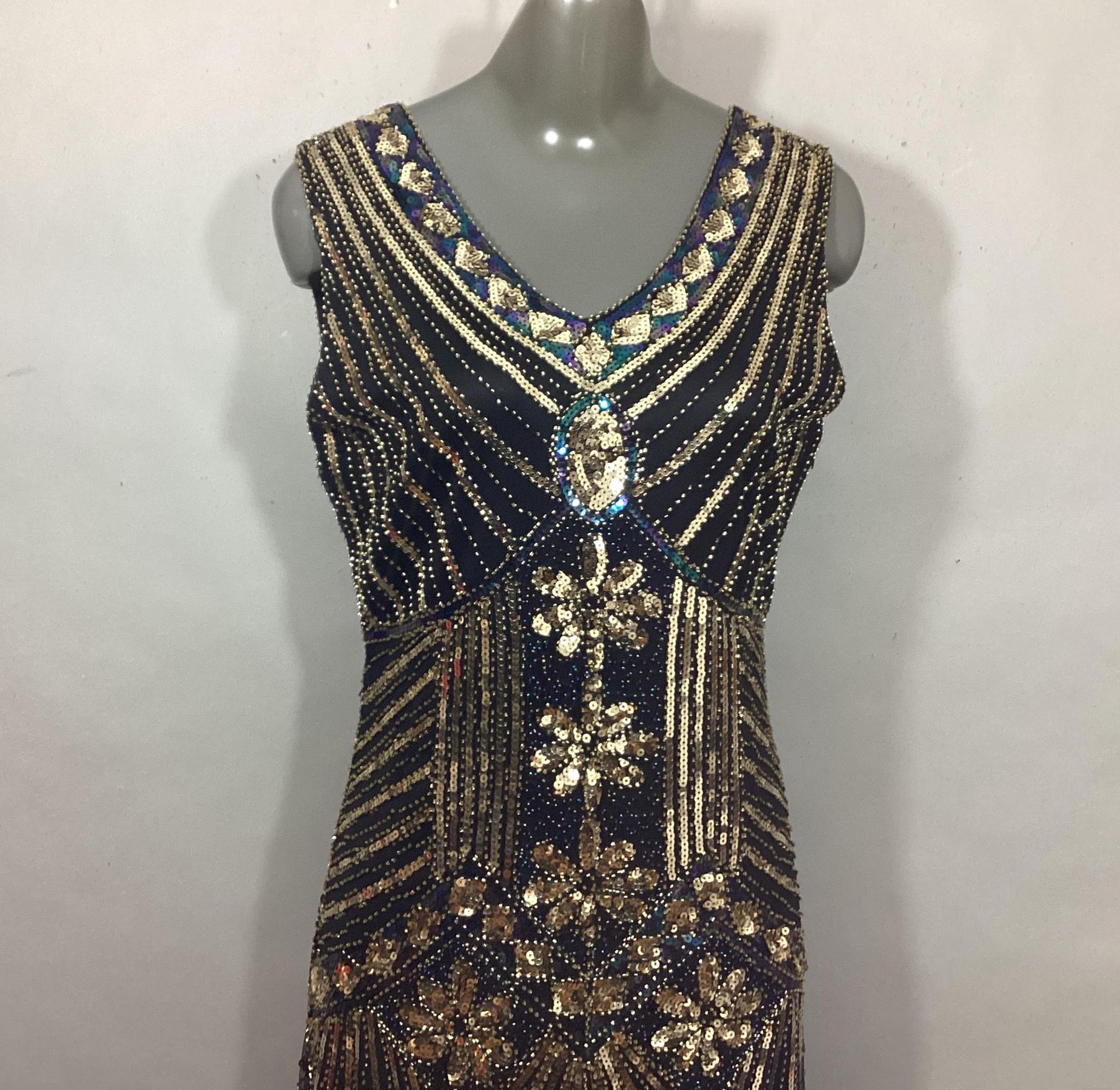 black sequin dress with gold shoes and how to style a black sequin dress