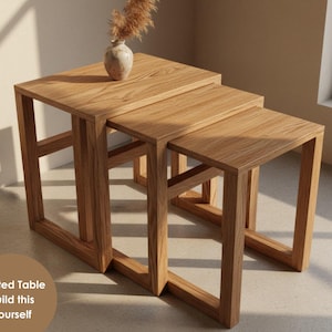 May include: A set of three ceramic mugs with a speckled, matte finish. The mugs are in shades of cream, gray, and black. Each mug has a simple, modern design, perfect for coffee or tea. The mugs are stacked on top of each other.