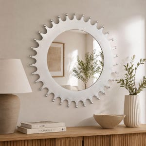 Espejo mexicano de hojalata hecho a mano, forma redonda con púas para decoración de pared.