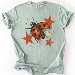 Star Ladybug T-Shirt, Starry Wings Insect Tee, Celestial Nature Shirt, Unique Beetle Lover Gift