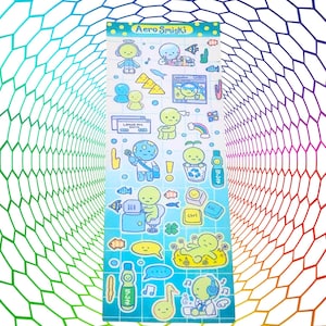 May include: Aero Smiski sticker sheet featuring various cartoon characters and icons in shades of blue, yellow, and green. The sheet includes images of fish, rainbows, and musical notes. The text "Aero Smiski" is at the top.