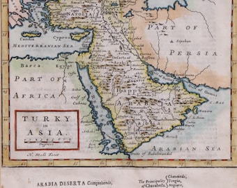 May include: Antique map of Arabia, featuring detailed geographical information. The map includes text in Latin, with labels for cities, seas, and regions. The map is framed with a decorative border and includes a scale for distance measurement.