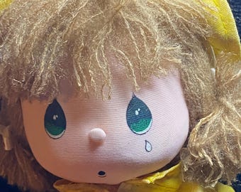 Precious moments raincoat doll - “Amy”