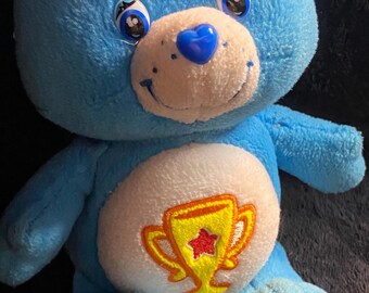 Care Bears Champ Bear Plush Blue w/Yellow Trophy