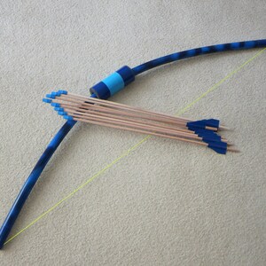 Blue bow and 8 arrows for kids archery.