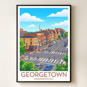 May include: A framed art print of Georgetown, Washington D.C. The illustration depicts a street scene with buildings, cars, pedestrians, and a blue sky with clouds. The word "GEORGETOWN" and "WASHINGTON D.C." are printed at the bottom.