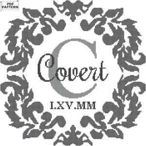 May include: A black and white cross stitch pattern featuring a decorative floral frame with a large letter "C" in the centre. The word "Covert" is written below the letter and the date "I.XV.MM" is written below the word.