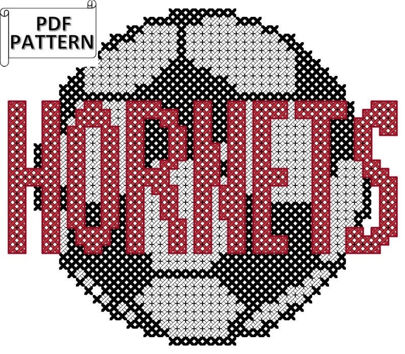 May include: Cross stitch pattern for a basketball with the word "Basket" in red lettering.