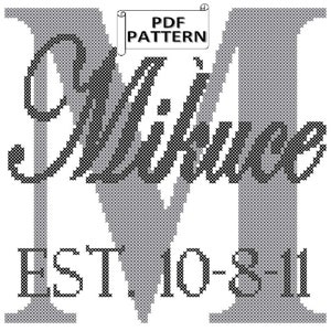 May include: Black and white cross stitch pattern for a monogram with the letter "M" and the word "Mine" in a cursive font. The text "EST 10-8-11" is below the monogram. The pattern is labeled "PDF PATTERN".