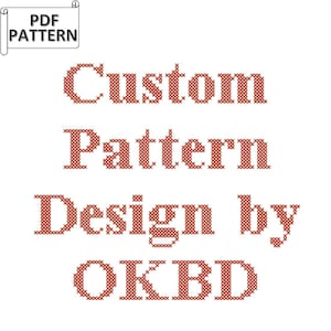 May include: White background with text in a cross-stitch style. The text reads "PDF PATTERN" in a banner, followed by "Custom Pattern Design by OKBD" in red cross-stitch font. The design suggests a downloadable pattern.