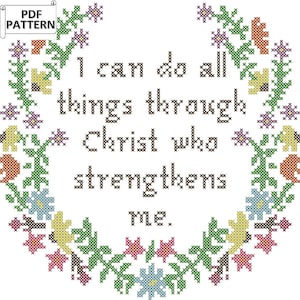 May include: Cross stitch pattern featuring a floral wreath with the quote "I can do all things through Christ who strengthens me."