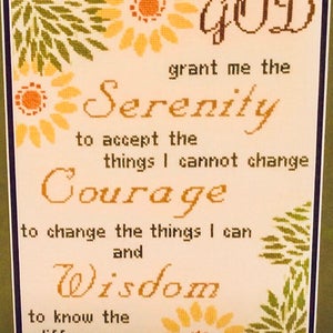 May include: A cross-stitch pattern with a yellow and green floral design. The text reads "GOD grant me the Serenity to accept the things I cannot change Courage to change the things I can and Wisdom to know the difference".