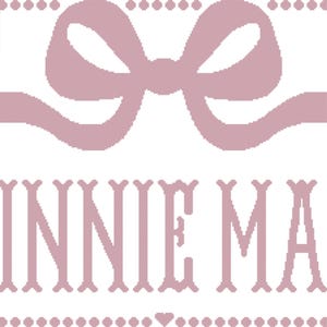 May include: A pink cross-stitch design on a white background. The design features a large bow at the top, the name "LINNIE MAE" in decorative letters, and the text "PDF PATTERN" in the upper left corner.