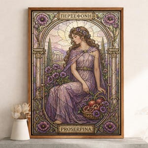 May include: A framed stained-glass style print featuring a woman in a purple gown, seated amidst flowers. The artwork includes the Greek words "PERSEPHONE" and "PROSERPINA". A basket of pomegranates and a floral crown are also visible.