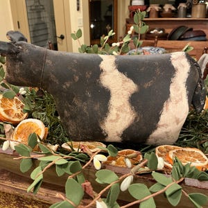 Primitive cow shelf sitter / bowl filler