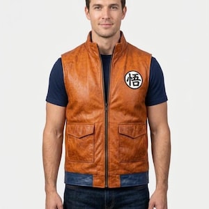 May include: A brown faux leather vest featuring a stand-up collar, a full-length front zipper, and two front flap pockets. The chest displays a circular white patch with the black Japanese kanji character for Go. A dark blue band accents the hem.
