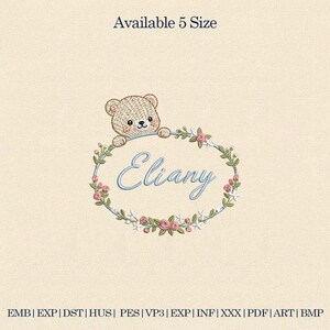 May include: An embroidered design featuring a teddy bear peeking over an oval frame. The frame is decorated with pink roses and green leaves, with the name "Eliany" in blue script. The text "Available 5 Size" is at the top.