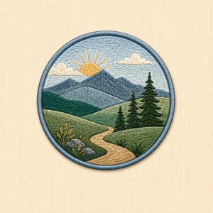 May include: A circular embroidered patch featuring a landscape scene with a winding tan path leading toward blue mountains under a yellow sun. The design includes green rolling hills, three dark green pine trees, two gray rocks, and white clouds.