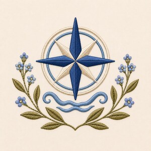 May include: An embroidery design featuring a central compass rose in dark blue and cream, positioned above two wavy blue lines. The design is framed by two symmetrical branches with green leaves and small light blue five-petaled flowers.