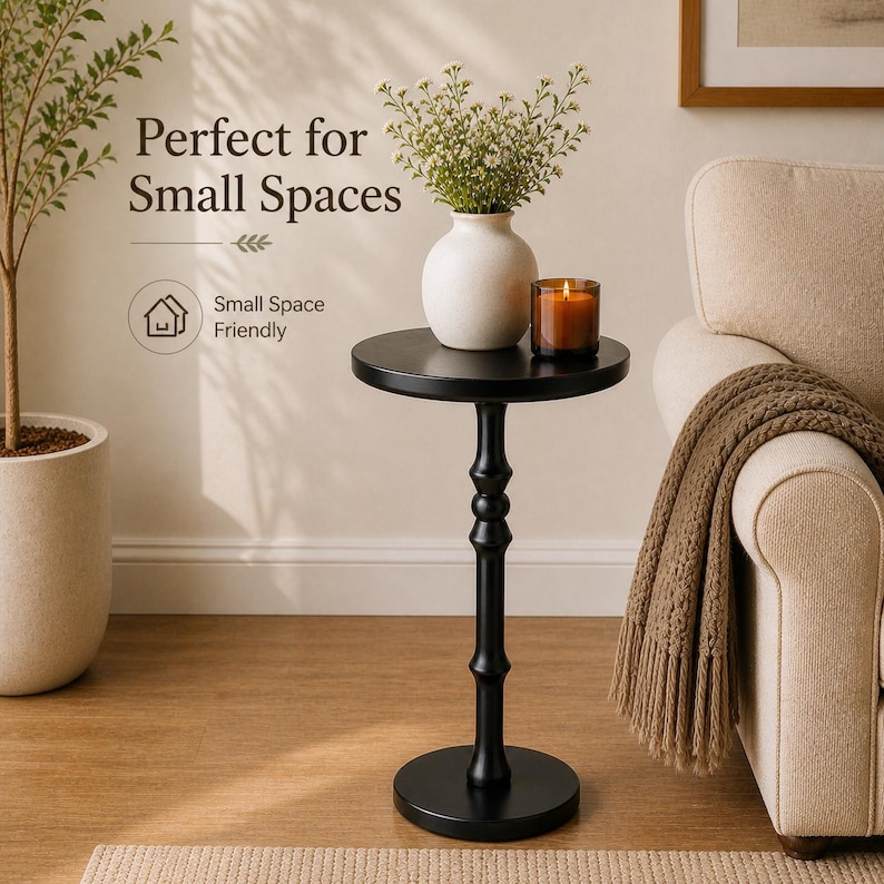 black small side table for small spaces with pedestal base in modern living room