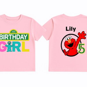 Custom Sesame Street kids’ birthday tee featuring fun graphics and bright lettering. Back personalization allows name and age, making it ideal for birthday boys and girls wanting a special party outfit.