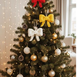 May include: A decorated Christmas tree with various ornaments. The tree features red, yellow, and white crocheted bow ornaments, along with gold, silver, and white baubles. Pinecones and string lights add to the festive decor.