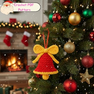 May include: A crocheted Christmas bell ornament in red and yellow hangs on a decorated Christmas tree. The bell has a yellow bow and trim. The text "Crochet PDF Pattern" is in the upper left corner. Other ornaments include red, gold, and green baubles.