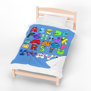 May include: A twin-sized bed with a light wood frame and a white pillow. The bed is covered with a blue blanket featuring the alphabet, each letter designed with a unique cartoon face and color.