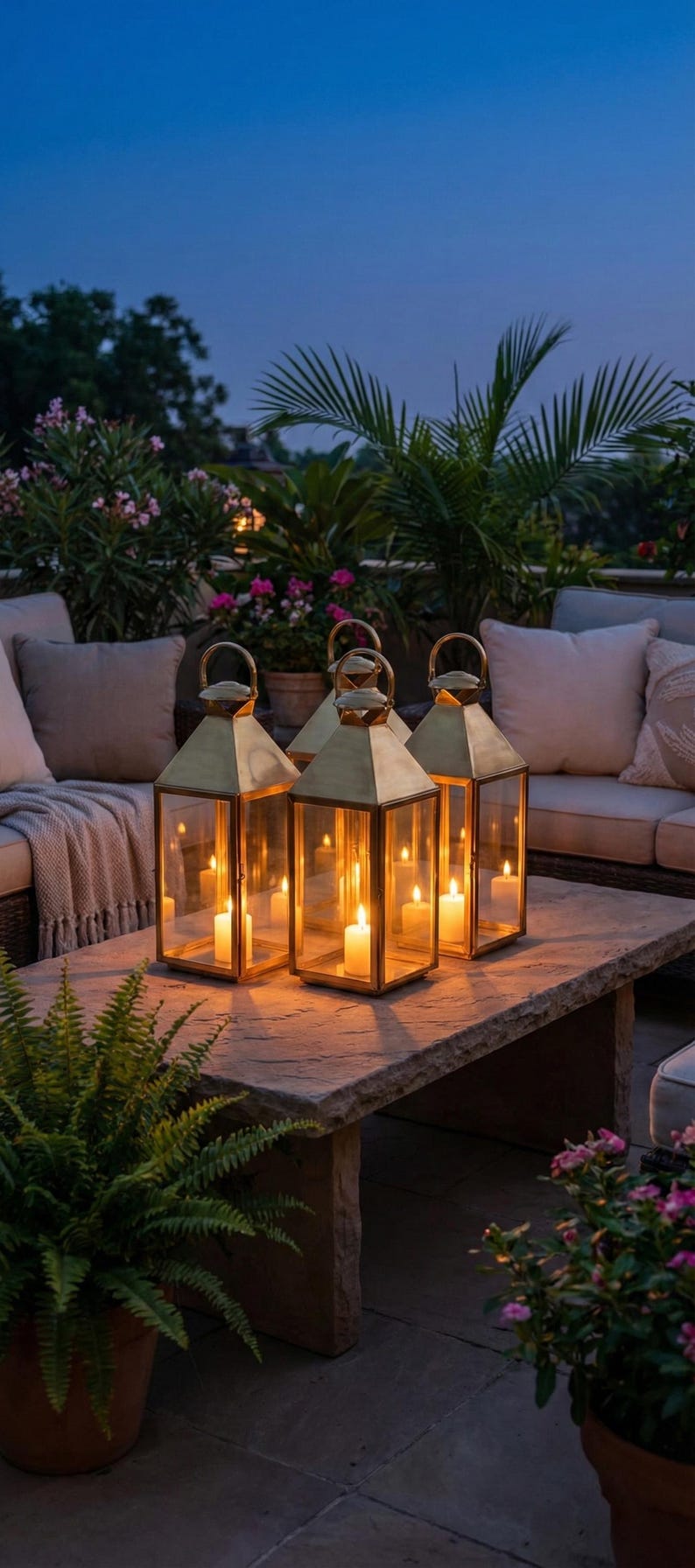 Handmade solid brass lantern candle holder with clear glass panels and polished brass finish