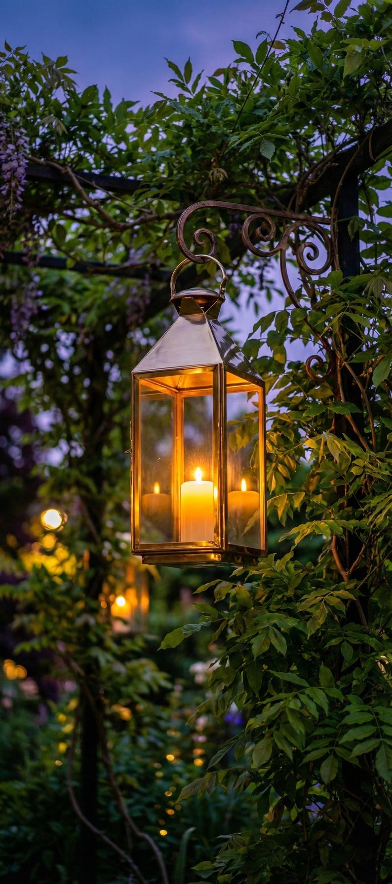 Handmade solid brass lantern candle holder with clear glass panels and polished brass finish