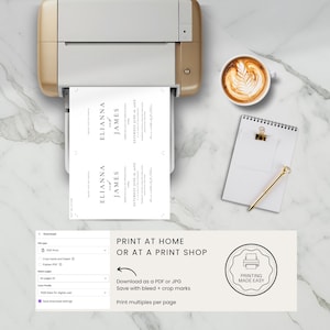 May include: A printer is shown printing wedding invitations with the names "Elianna" and "James" on white paper. A cup of coffee, a notepad, and a pen are on the marble surface. The text "Print at Home or at a Print Shop" is also visible.