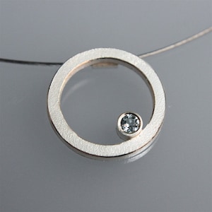 Contemporary handmade silver pendant Q with blue topaz image 1